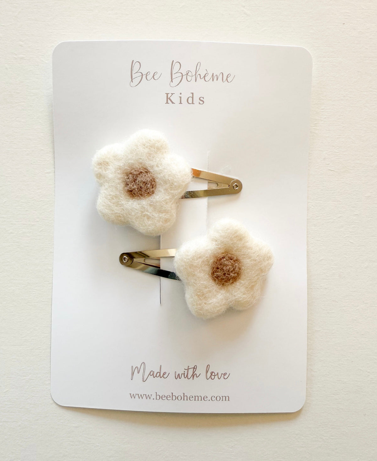 Duo de barrettes fleurs en laine feutrée pour enfant
